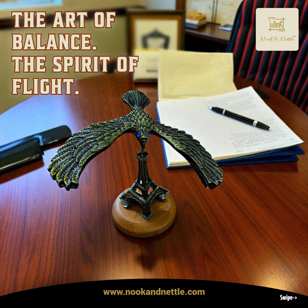 N&N Balancing Eagle on Eiffel Tower