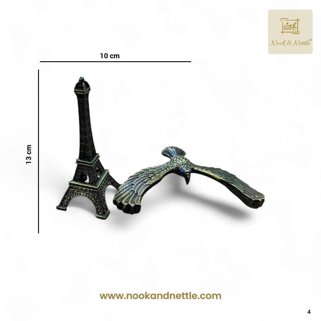 N&N Balancing Eagle on Eiffel Tower